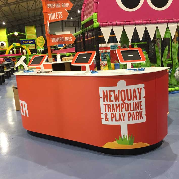 Retail counter with ipad holders for Newquay trampoline park